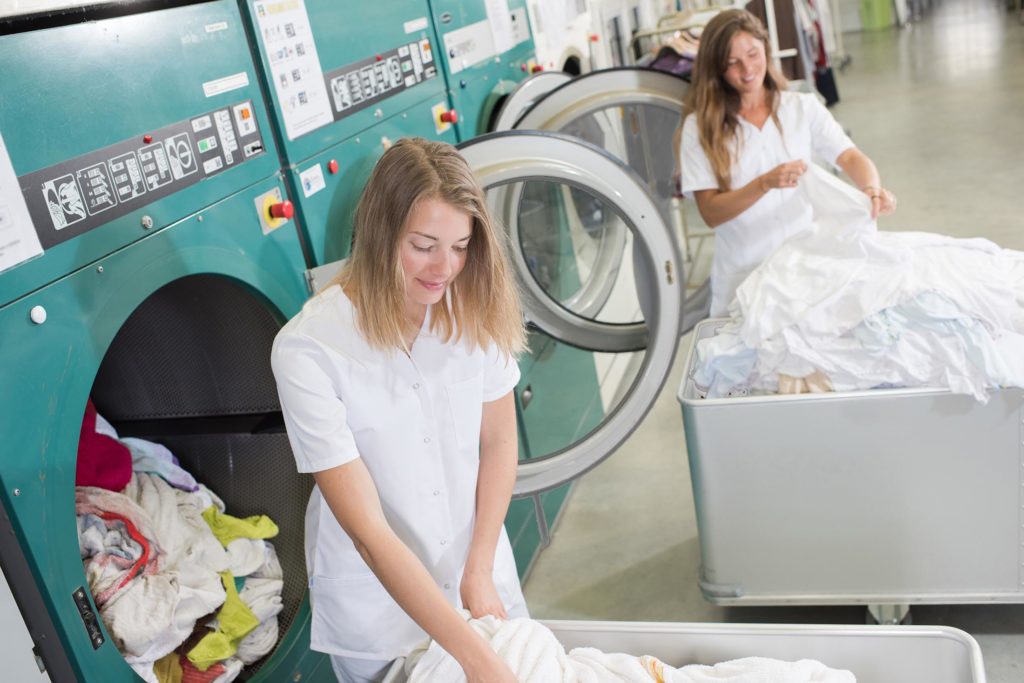 Textile Care Services laundry team